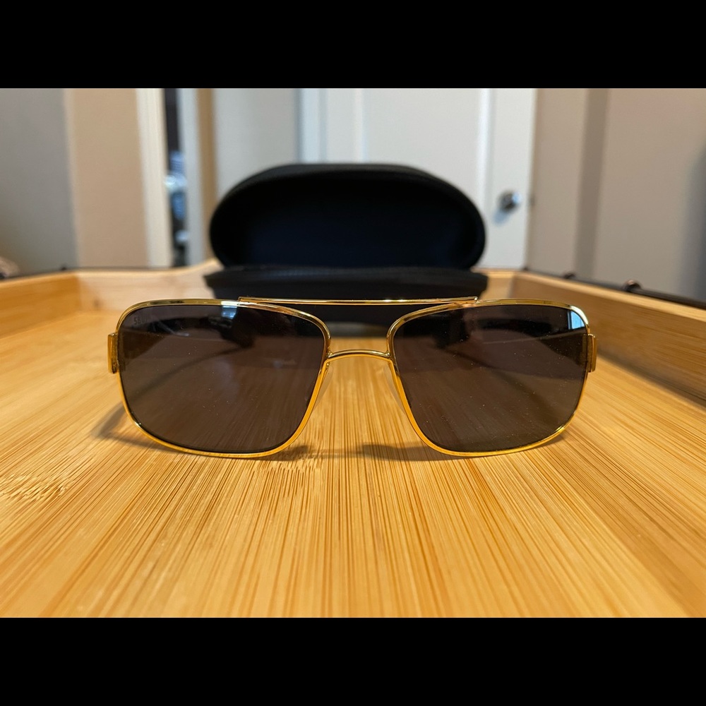 Costa Cocos, never worn, black costas case.